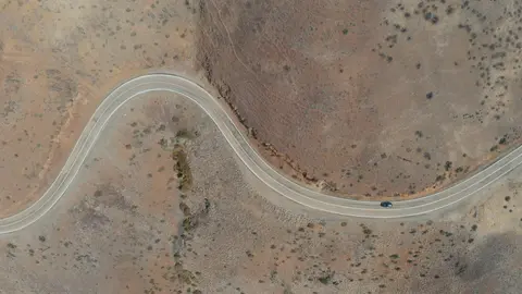 Car on a desert road